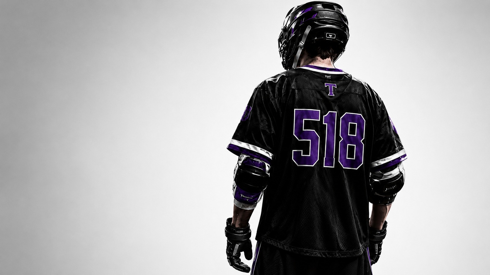 Trust Lacrosse player wearing number 518